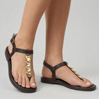 S-12 SANDALIA MARRÓN PIEZAS DORADAS